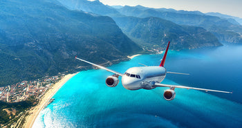 plane flying over water