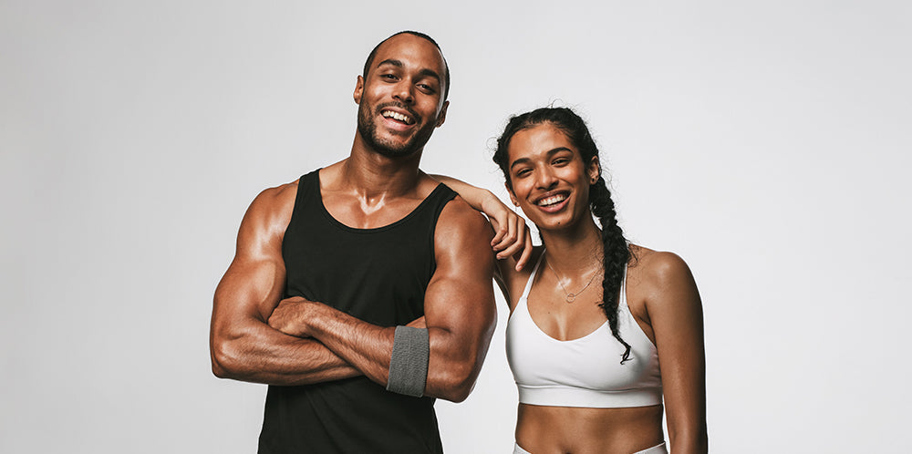 athletic man and women  smiling