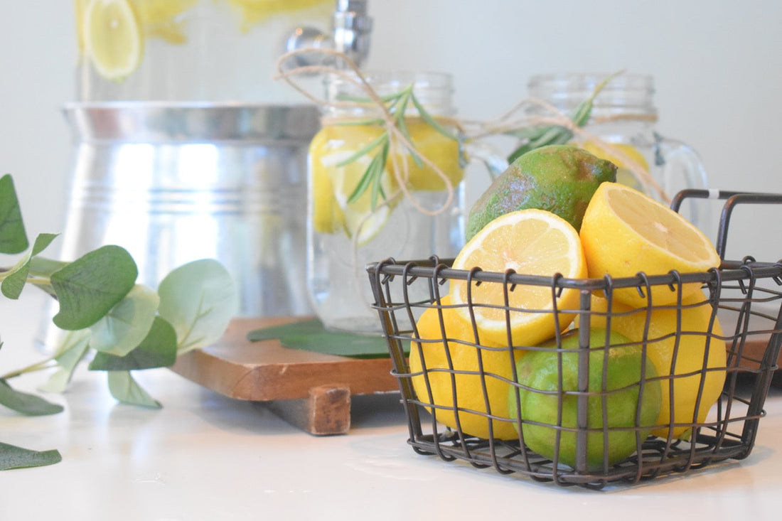 lemons and limes on countertop