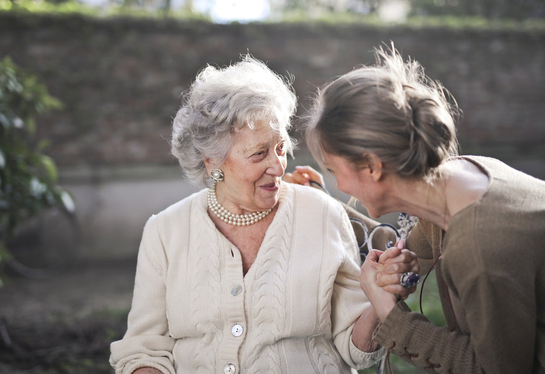 older women sitting and talking